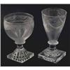 Image 1 : A set of six late Georgian wine glasses, engraved with festoons, on short cylindrical stems and s...