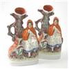 Image 1 : A pair of Victorian Staffordshire 'Little Red Riding Hood' spill vases, character seated beside t...