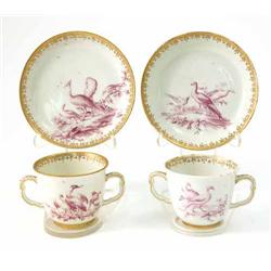 A pair of Chelsea chocolate cups and saucers, gold anchor marks and period, 1756-69, cups with tw...