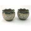 Image 1 : A pair of Langley Ware stoneware jardinieres, glazed in green with a broad band of painted flower...