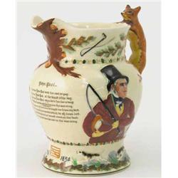 A Fieldings Crown Devon earthenware musical John Peel jug, decorated with a moulded fox handle an...