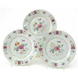 A set of three Canton side plates, brightly painted with flowers, 6.5in....