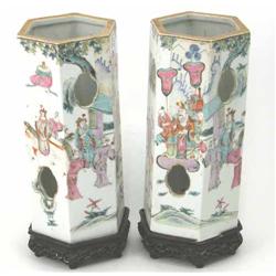 A pair of 'famille rose' lanterns, hexagonal shape with pierced sides, painted with figures at va...