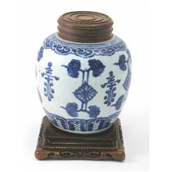 A Chinese ginger jar, probably Kangxi period, painted with peony and scrolls in underglaze blue,...