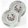 Image 1 : A pair of 18th century Chinese Imari plates, painted with a chrysanthemum pattern in typical colo...