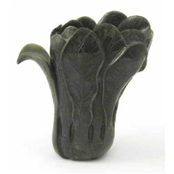 A Chinese carved jade libation cup, carved as pok choi, 7ins...