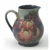 Image 1 : A Moorcroft 'Finches' jug, designed by Sally Tuffin, decorated in shades of blue, green and red a...