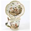 Image 1 : A Meissen cabinet cup and saucer, of lobed shape, cup with stork handle, painted with nymphs at v...