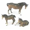 Image 1 : A Beswick figure of a mare, modelled with head down facing right, a standing shire foal and anoth...