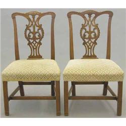 A set of six Victorian Chippendale design mahogany single chairs, with fancy carved splats on cha...