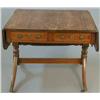 Image 1 : A late George III yew sofa table, with two real and two dummy drawers, rounded reeded flaps on tu...