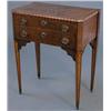 Image 1 : A late 18th century Continental side table, with star burst and parquetry banded top over two dra...