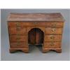 Image 1 : An early 18th century cross banded and herring bone inlaid walnut kneehole desk, fitted with seve...