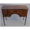 Image 1 : A George III banded mahogany breakfront dressing table, with three small drawers about a kneehole...