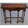 Image 1 : A William & Mary design banded walnut folding tea table, on turned baluster supports and bun feet...
