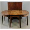 Image 1 : A George III mahogany 'D' end extending dining table, fitted two spare leaves on square fluted le...