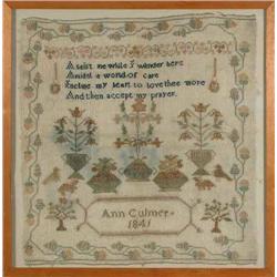 A Victorian sampler, worked with a verse and motifs within a strawberry border, by Ann Culmer 184...