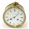 Image 1 : A brass drum clock by Dent, Cockspur Street, with moon hands, enamelled dial and bell striking mo...