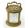 Image 1 : A 19th century French oval repeating carriage clock with alarm, enamelled dial with moon hands an...