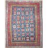 Image 1 : A Shirvan rug, woven with rows of stylised flowerheads on a blue ground within a triple border, 4...