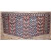 Image 1 : A Turkoman saddlebag rug, woven with alternate red and blue panels of arrows, 2ft 6ins x 3ft 8ins...