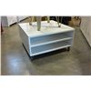 Image 1 : WHITE ROLLING COFFEE TABLE