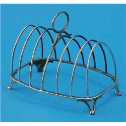 A William IV silver six division toast rack, with loop handle and scroll feet, maker Robert Henne...