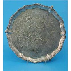 A George III silver salver, with gadrooned border and overall engraved floral decoration, maker J...