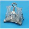 Image 1 : A Victorian plated cruet stand, with five facetted glass bottles and stoppers and silver topped m...