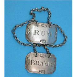 A pair of George III silver spirit labels, Brandy and Rum, makers Phipps & Robinson, London 1813...