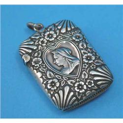 A Victorian silver vesta case of Royal interest, the front decorated with a heart shaped relief b...