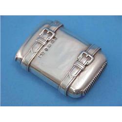 A novelty Victorian silver vesta case, modelled as a leather strap bound travelling case, maker G...
