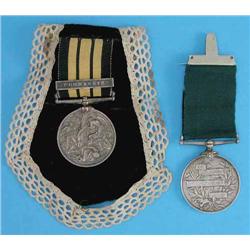 An Ashantee medal, with Coomassie clasp to 2111 Pte. G.Morgan 2Bn. Rifle Bde 1873-4 (EF) and an E...