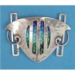 An Edwardian Art Nouveau hammered silver and blue and green enamelled belt buckle...