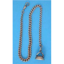 A Victorian 9ct gold graduated curb link watch chain, and a Regency gold and cornelian fob seal o...