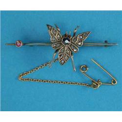 A Victorian gold 'fly' brooch, set diamonds, rubies and a sapphire (cased)...