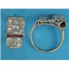 Image 1 : A 1940's cocktail ring, pave-set with diamonds and a line of calibre-cut rubies...