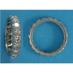A platinum diamond set full eternity ring, size P...