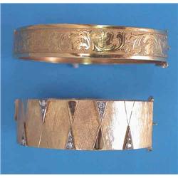 An 18k gold hinged bangle, the textured geometric front set 12 diamonds and an 18k gold hinged ba...
