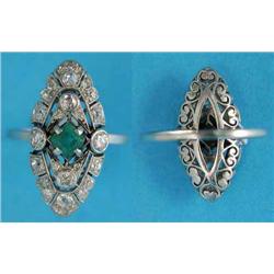 A platinum, emerald and diamond marquise shaped cluster ring, set with a central square emerald a...