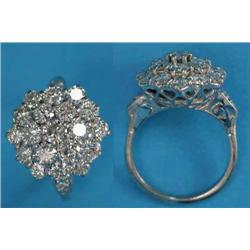 A white gold all diamond hexagonal shaped cluster ring, with diamond set shoulders...