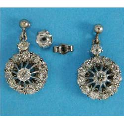 A pair of diamond cluster drop earrings, each set with 12 old cut diamonds on a single stone diam...