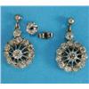 Image 1 : A pair of diamond cluster drop earrings, each set with 12 old cut diamonds on a single stone diam...