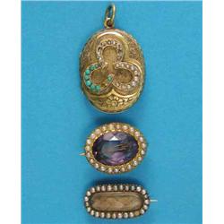 A Victorian foliate engraved gold locket, the front applied with 3 horseshoes set diamonds, pearl...
