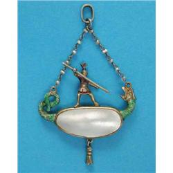 A 19th century silver gilt, enamel and mother-of-pearl pendant, depicting St George and The Drago...