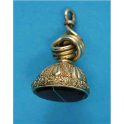 A Victorian gold plated and onyx fob seal, with chased decoration and 'knot' surmount...