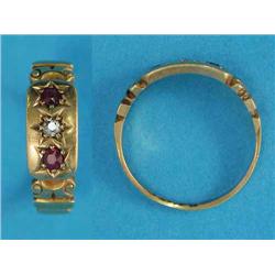 A late Victorian 18ct gold ring, gypsy set with a diamond and 2 rubies...