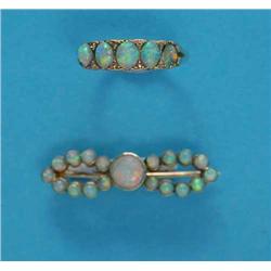 An Edwardian gold and opal bow brooch, and a Victorian 5-stone opal half hoop ring...