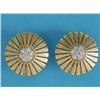 Image 1 : A pair of 18ct gold and diamond earrings, each designed as a stylised circular flowerhead with a...