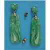 Image 1 : A pair of gold mounted carved jade drop earrings...